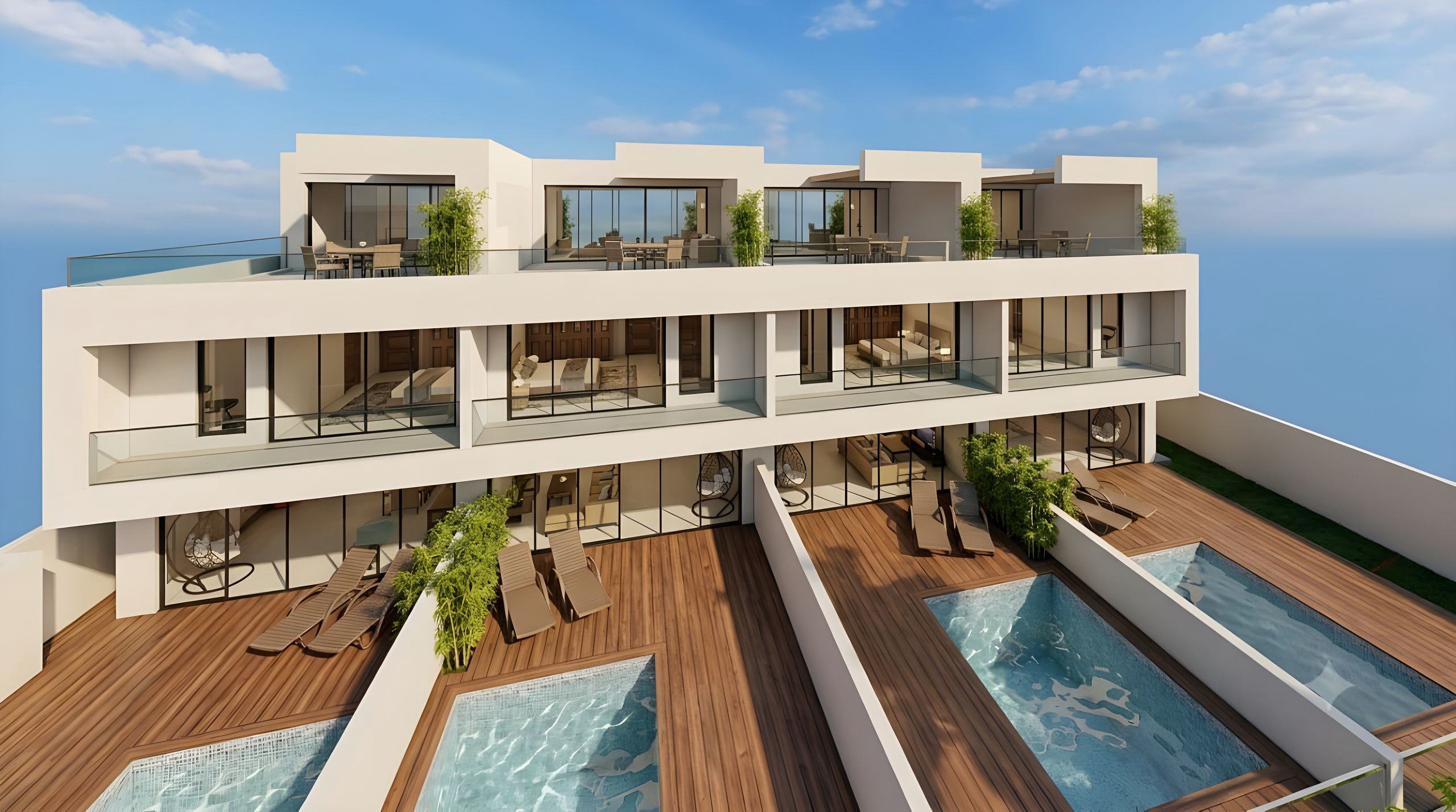 Geckos Villa vista desde lo alto por detrás: townhouses en hilera, cada una con deck de madera y piscina, y terrazas con comedor en la azotea. Render referencial.